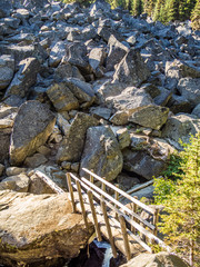 Bridge over the stream on the trail at Alpine Wilderness in North Cascade Mountains