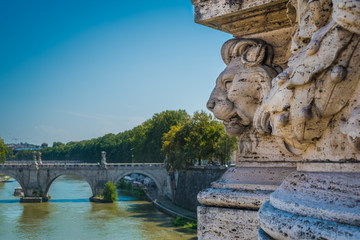 Lion's face present at the base of the sculptures of the Vittorio Emanuele II bridge in Rome, Italy