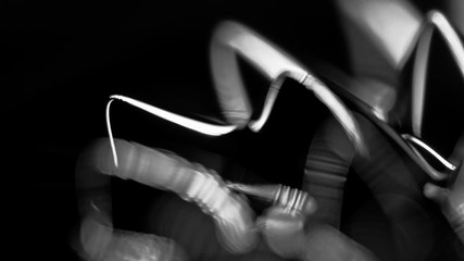 fluid forming spikes in a dark abstract atmosphere