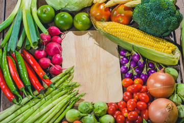 Backgroud of fresh food tasty and healthy varis vegetables are on the wooden table