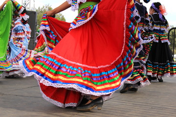 Colorful skirts fly during Mexican dancing