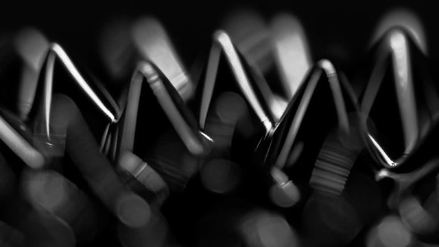 fluid forming spikes in a dark abstract atmosphere