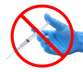 No vaccination sign, vaccines products in syringe instrument on the hand of doctor in blue medical...