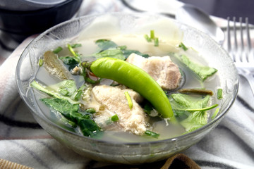 Freshly cooked Filipino dish called pork sinigang or pork cooked in tamarind soup