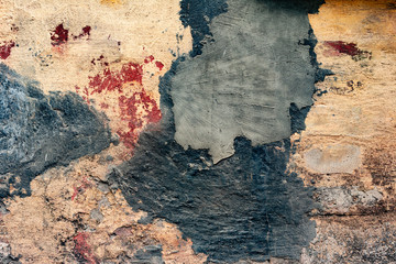 Texture of a concrete wall with cracks and scratches which can be used as a background