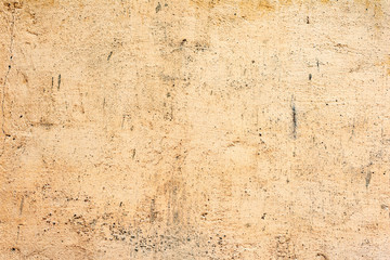 Texture of a concrete wall with cracks and scratches which can be used as a background