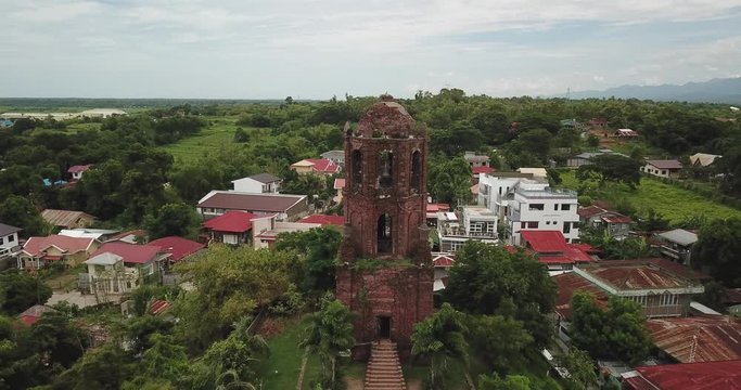 Old spanish colony Bell Tower in Vigan cinematic droneshot 4k