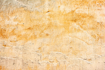 Texture of a concrete wall with cracks and scratches which can be used as a background