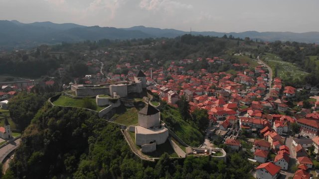 beautiful small town with castle on hill called Tešanj
