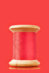 Spool with red thread