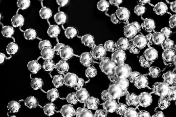 Christmas decoration on a dark surface close up black and white. Abstract background