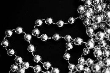 Christmas decoration on a dark surface close up black and white. Abstract background