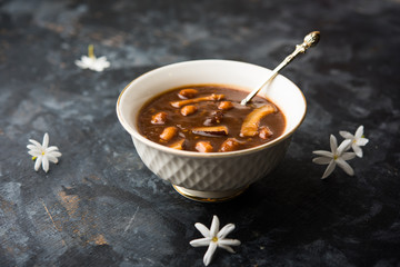 ambrosia or Panchamrit or Panchamrut or Panchamrutham or Panchamrutha is a sweet and sour food offered in prayers or puja to hindu Deity or gods