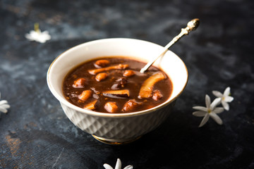 ambrosia or Panchamrit or Panchamrut or Panchamrutham or Panchamrutha is a sweet and sour food offered in prayers or puja to hindu Deity or gods