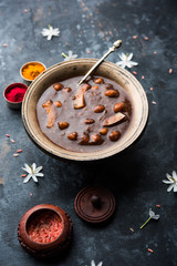 ambrosia or Panchamrit or Panchamrut or Panchamrutham or Panchamrutha is a sweet and sour food offered in prayers or puja to hindu Deity or gods
