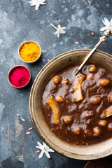 ambrosia or Panchamrit or Panchamrut or Panchamrutham or Panchamrutha is a sweet and sour food offered in prayers or puja to hindu Deity or gods