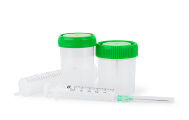 New containers for sampling and syringe on a white background
