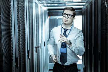 Professional in a blue shirt working in the office