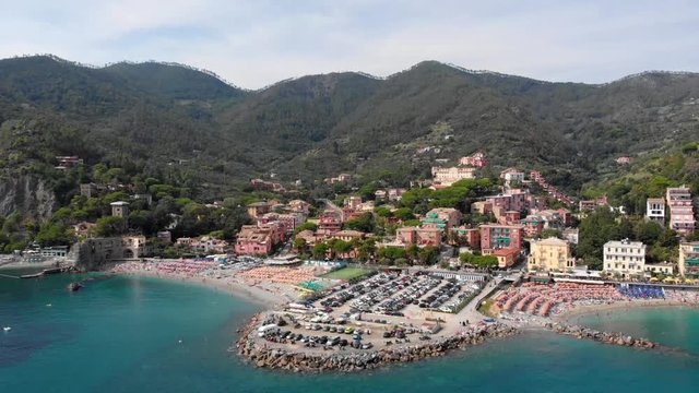 In La Spezia or Cinque Terre, the drone flies in from over the sea to the land of Monterosso al Mare.