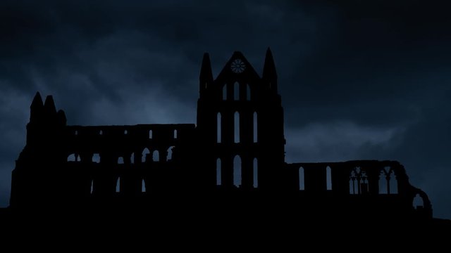 Whitby Abbey Castle with Storm and Lightning, Ruined Gothic Church which Inspired Bram Stoker to write his Famous Novel Dracula, England, UK