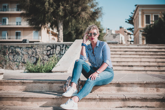 Vogue concept. Plus size model in holidays, modern woman wear casual style. Fashionable lady outdoors portrait - Powered by Adobe