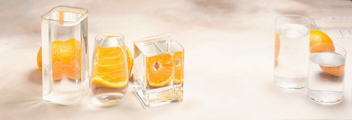 Foods distorted through liquid and glass on light background.