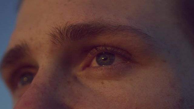Handsome Man With The Sun Set In His Eyes As He Watches It 