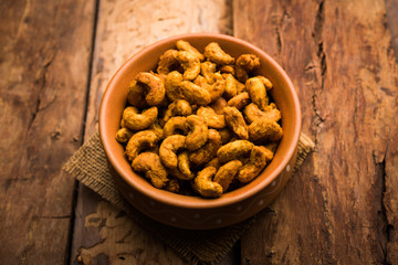 Kaju Pakoda/pakora OR Cashew Nut Fritters or bhajji, is a tasty snack from India, served as Chakna