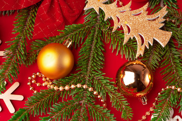 Obraz na płótnie Canvas Christmas decorations background on red with copy space