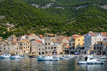 Fototapeta na wymiar Seaside view of Komiža town on Vis island, Croatia