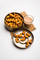 Kaju Pakoda/pakora OR Cashew Nut Fritters or bhajji, is a tasty snack from India, served as Chakna