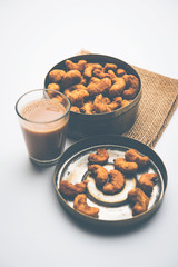 Kaju Pakoda/pakora OR Cashew Nut Fritters or bhajji, is a tasty snack from India, served as Chakna