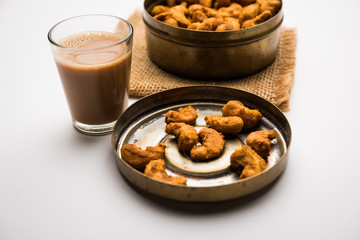 Kaju Pakoda/pakora OR Cashew Nut Fritters or bhajji, is a tasty snack from India, served as Chakna