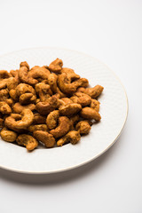Kaju Pakoda/pakora OR Cashew Nut Fritters or bhajji, is a tasty snack from India, served as Chakna