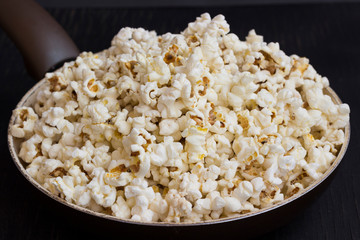 Fried popcorn in a pan, close up