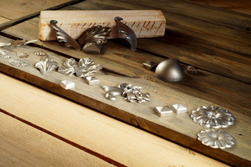 Stamped elements of various shapes: flowers, maple and birch leaves, cubes, hemisphere, other curly...