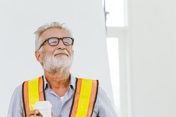 American professional worker senior engineer pleased for good work job done and ready for...
