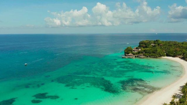 Beautiful Punta Bunga Beach on Boracay island, Philippines.Hotels near the beach in sunny weather. The coast of the island of Boracay for tourists.