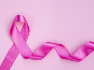 Flat lay breast cancer concept with ribbon