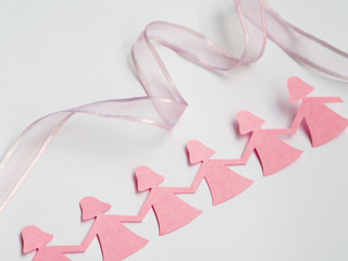 Pink paper girl holding hands