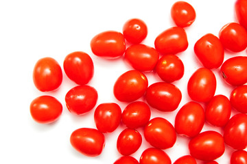 Red cherry tomatoes on a white background
