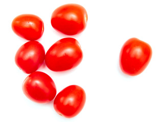 Red cherry tomatoes on a white background