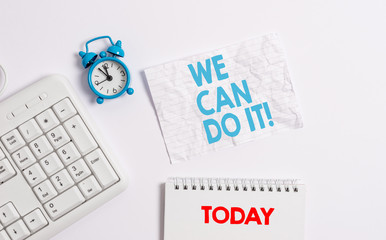Text sign showing We Can Do It. Business photo showcasing see yourself as powerful capable demonstrating Blank paper with copy space on the table with clock and pc keyboard