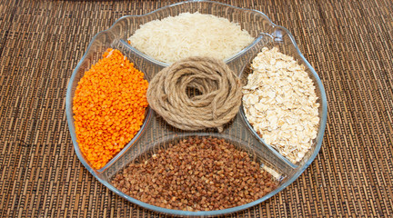 groats buckwheat lentils rice corn oatmeal on a white background