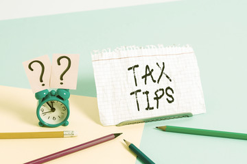 Handwriting text writing Tax Tips. Conceptual photo compulsory contribution to state revenue levied by government