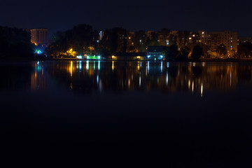 night city reflection in the lake water