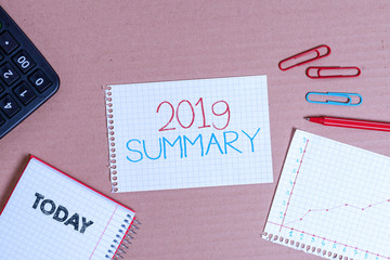 Writing note showing 2019 Summary. Business concept for brief comprehensive especially covering the main points of 2019 Cardboard notebook office study supplies chart paper