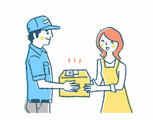 宅配業者から荷物を受け取る主婦