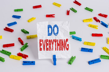 Text sign showing Do Everything. Business photo showcasing Jack of All Trades Self Esteem Ego Pride No Limits Colored clothespin papers empty reminder white floor background office