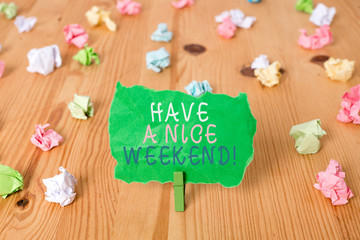 Word writing text Have A Nice Weekend. Business photo showcasing wishing someone that something nice happen holiday Colored crumpled papers empty reminder wooden floor background clothespin